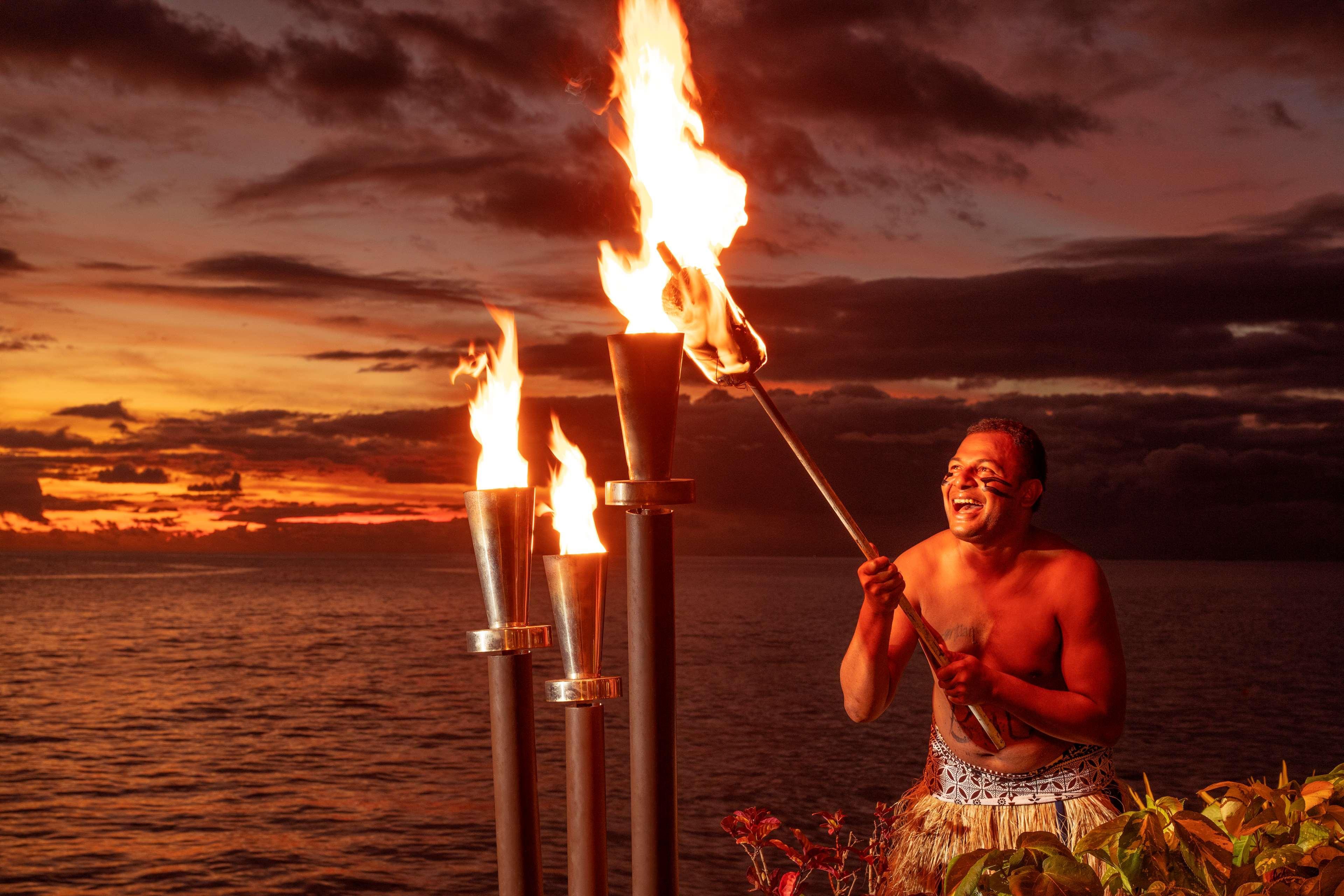 Radisson Blu Resort Fiji Denarau Island Exterior photo A Samoan fire knife dancer